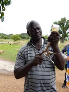 Truth about goats: A veterinarian prepares to vaccinate a goat