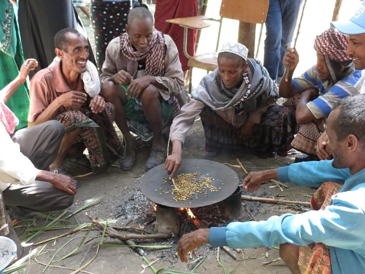 Spreading the love: Men perform a coffee ceremony in Ethiopia, a role traditionally performed only by women.
