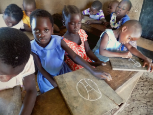 A hopeful future: Mackline draws on a chalkboard