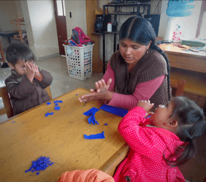 Teach with love: Andrea with children at the la barranca centre