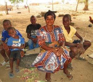 Farmer collective: Madam Akasele with her sons