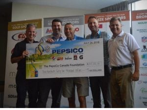 PepsiCo Canada Foundation members smiling holding a cheque for Kinvia