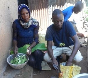 Abdallah helps Aisha make dinner