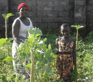 Praise and Rebecca in their garden