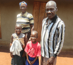 Melan and her two sisters and grandparents