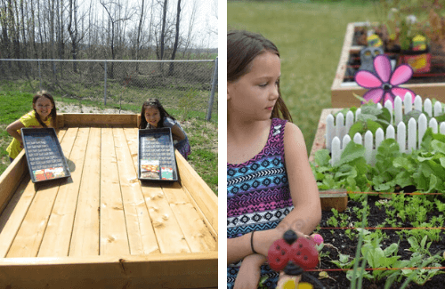 Two girls pose with their seedings and star at their crops