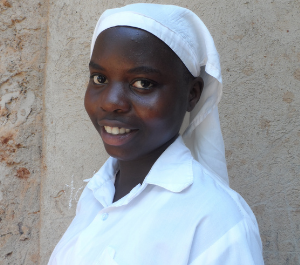 portrait of a preteen girl smiling for the camera