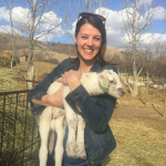 Jenine Kozey holds a goat.