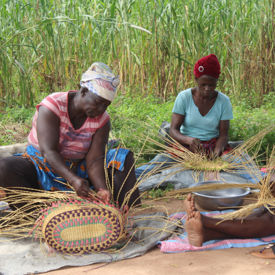 women weaving baskets